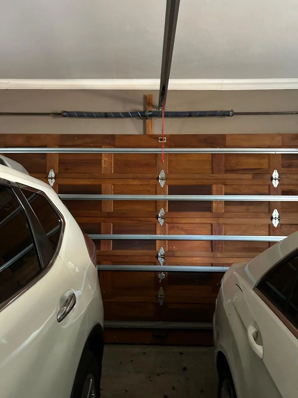 Sectional garage door spring and automation repair for Security Systems, Garage Doors & Gate Automation